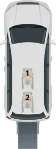 Top view of a vehicle containing two wheelchair users labeled 1 and 2, positioned side by side inside the vehicle.