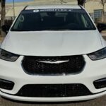 White Chrysler Pacifica with Driverge Rear Entry Manual Fold Out conversion