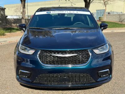 Blue Chrysler Pacifica with Driverge Rear Entry Manual Fold Out conversion