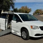White Dodge Grand Caravan with BraunAbility Side Entry Manual Fold Out conversion