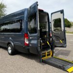 Blue Ford Transit with BraunAbility Rear Entry Automatic Fold Out conversion