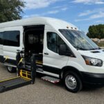 White Ford Transit with BraunAbility Side Entry Automatic Fold Out conversion