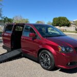 Red Dodge Grand Caravan with Vantage Mobility Side Entry Automatic Fold Out conversion
