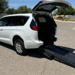 White Chrysler Pacifica with BraunAbility Rear Entry Manual Fold Out conversion