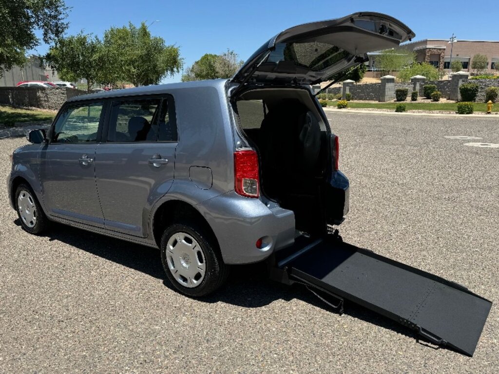 Blue Scion xB with Freedom Motors Rear Entry Manual Fold Out conversion