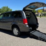 Grey Dodge Grand Caravan with FR Conversions Rear Entry Manual Fold Out conversion