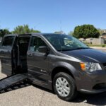 Grey Dodge Grand Caravan with BraunAbility Side Entry Manual Fold Out conversion