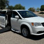 White Dodge Grand Caravan with Vantage Mobility Side Entry Automatic In Floor conversion