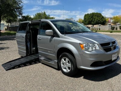 Silver Dodge Grand Caravan with BraunAbility Side Entry Automatic Fold Out conversion