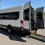 White Ford Transit with BraunAbility Rear Entry Automatic Fold Out conversion