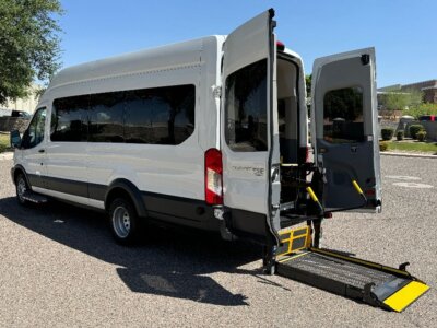 White Ford Transit with BraunAbility Rear Entry Automatic Fold Out conversion