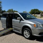 Silver Dodge Grand Caravan with Eldorado Side Entry Manual Fold Out conversion