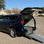Blue Chrysler Pacifica with Driverge Rear Entry Manual Fold Out conversion