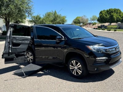 Black Honda Pilot with Vantage Mobility Side Entry Manual In Floor conversion