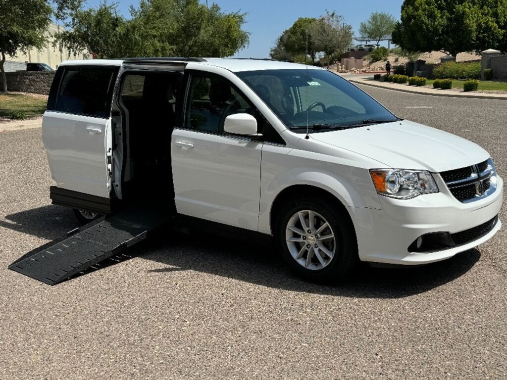 White Dodge Grand Caravan with Vantage Mobility Side Entry Automatic Fold Out conversion