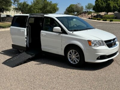 White Dodge Grand Caravan with Vantage Mobility Side Entry Automatic Fold Out conversion