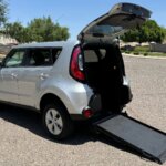 Silver Kia Soul with Freedom Motors Rear Entry Manual Fold Out conversion