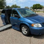 Blue Dodge Grand Caravan with BraunAbility Side Entry Automatic Fold Out conversion