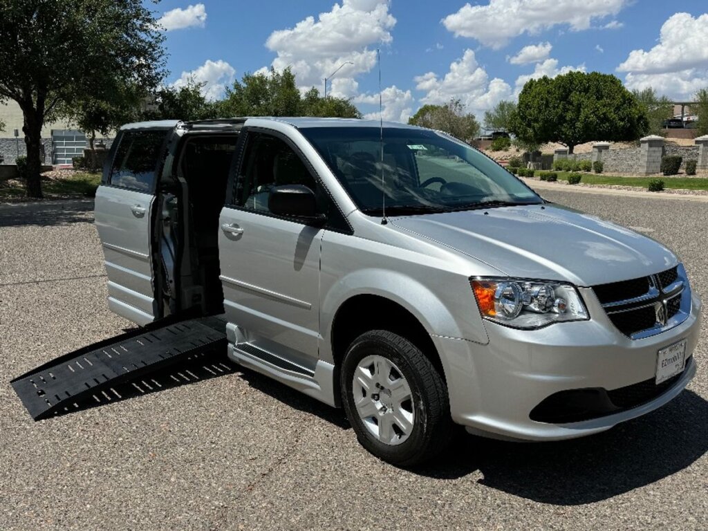 Silver Dodge Grand Caravan with BraunAbility Side Entry Automatic Fold Out conversion
