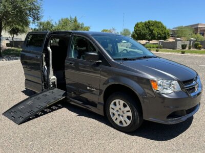 Grey Dodge Grand Caravan with BraunAbility Side Entry Manual Fold Out conversion