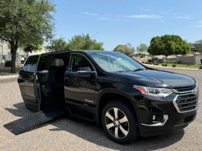 Black Chevrolet Traverse with BraunAbility Side Entry Automatic In Floor conversion