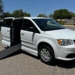 White Dodge Grand Caravan with Vantage Mobility Side Entry Manual In Floor conversion