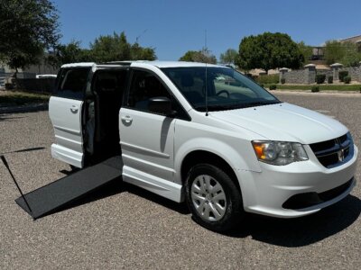 White Dodge Grand Caravan with Vantage Mobility Side Entry Manual In Floor conversion