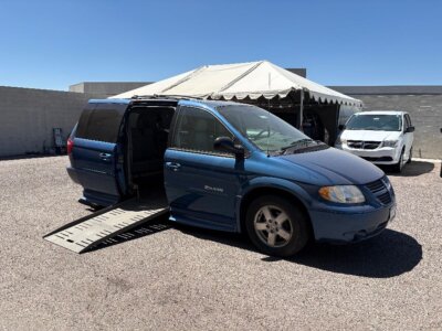 Blue Dodge Grand Caravan with BraunAbility Side Entry Automatic Fold Out conversion