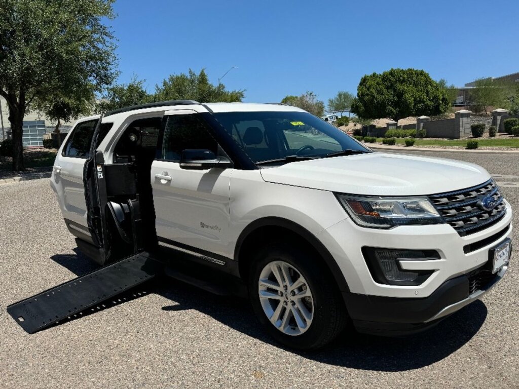 White Ford Explorer with BraunAbility Side Entry Automatic In Floor conversion
