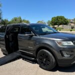 Grey Ford Explorer with BraunAbility Side Entry Automatic In Floor conversion