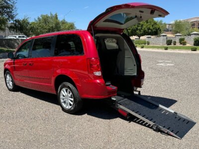 Red Dodge Grand Caravan with Adaptive Vans Rear Entry Manual Fold Out conversion