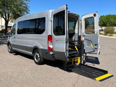 Silver Ford Transit with BraunAbility Rear Entry Automatic Fold Out conversion