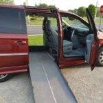 Red Chrysler Town and Country with Other Side Entry Automatic Fold Out conversion