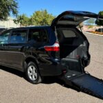 Grey Toyota Sienna with FR Conversions Rear Entry Manual Fold Out conversion
