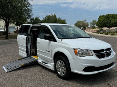 White Dodge Grand Caravan with BraunAbility Side Entry Manual Fold Out conversion