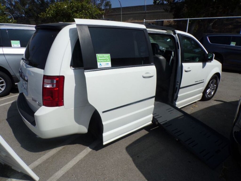 White Dodge Grand Caravan with BraunAbility Side Entry Automatic Fold Out conversion