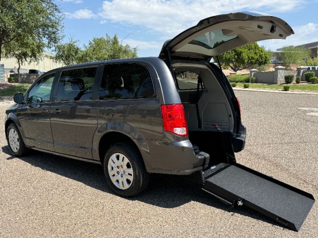 Grey Dodge Grand Caravan with International Sales and Mobility Rear Entry Manual Fold Out conversion