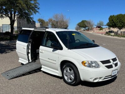 White Dodge Grand Caravan with BraunAbility Side Entry Automatic Fold Out conversion
