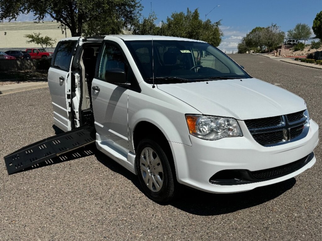 White Dodge Grand Caravan with BraunAbility Side Entry Manual Fold Out conversion