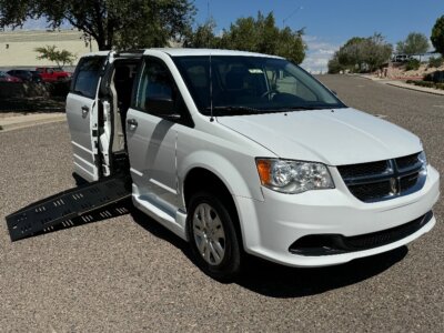 White Dodge Grand Caravan with BraunAbility Side Entry Manual Fold Out conversion