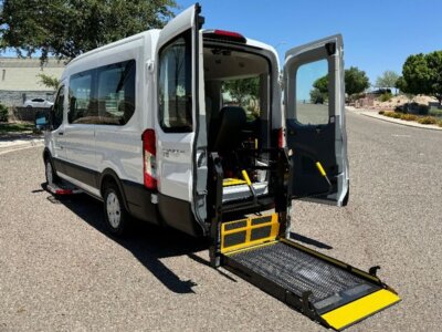White Ford Transit with BraunAbility Rear Entry Automatic Fold Out conversion