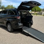 Black Toyota Sienna with Driverge Rear Entry Manual Fold Out conversion