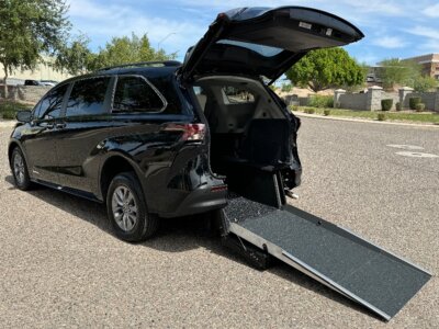 Black Toyota Sienna with Driverge Rear Entry Manual Fold Out conversion