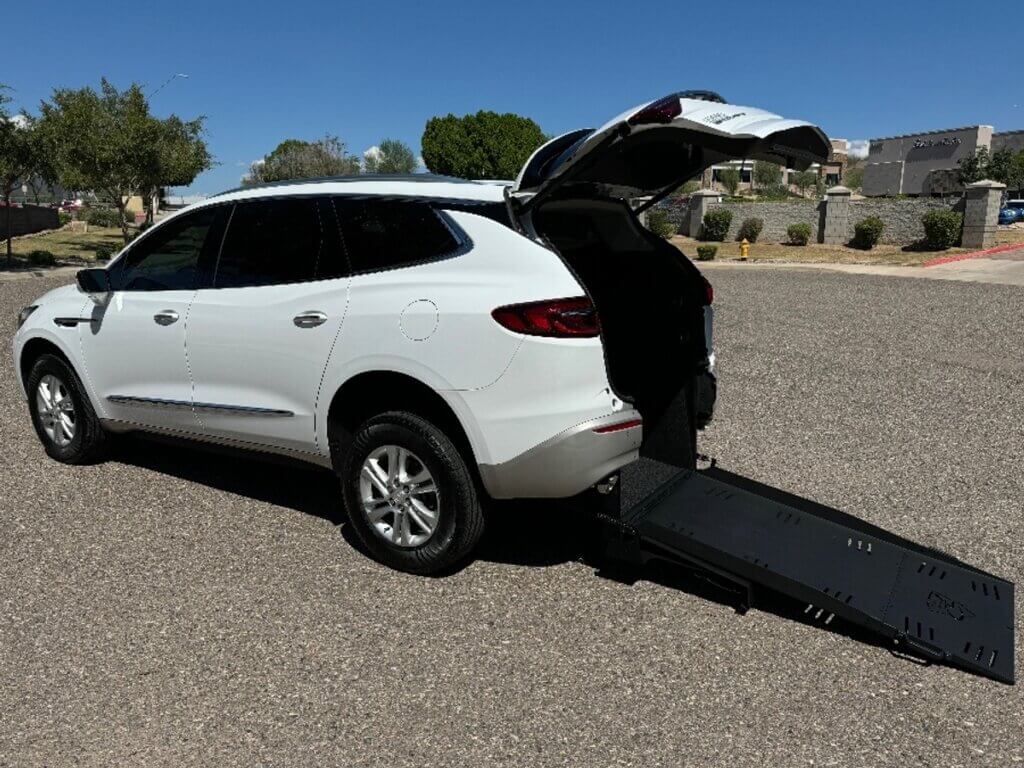 White Buick Enclave with Freedom Motors Rear Entry Manual Fold Out conversion