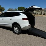 White Buick Enclave with Freedom Motors Rear Entry Manual Fold Out conversion