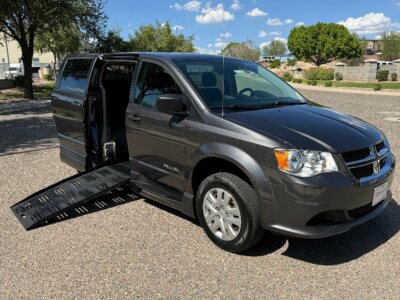 Grey Dodge Grand Caravan with BraunAbility Side Entry Manual Fold Out conversion