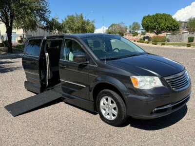 Black Chrysler Town and Country with Vantage Mobility Side Entry Automatic In Floor conversion