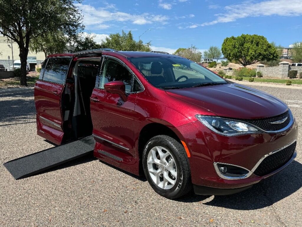 Red Chrysler Pacifica with Vantage Mobility Side Entry Automatic In Floor conversion