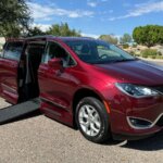 Red Chrysler Pacifica with Vantage Mobility Side Entry Automatic In Floor conversion