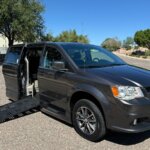 Grey Dodge Grand Caravan with BraunAbility Side Entry Automatic Fold Out conversion